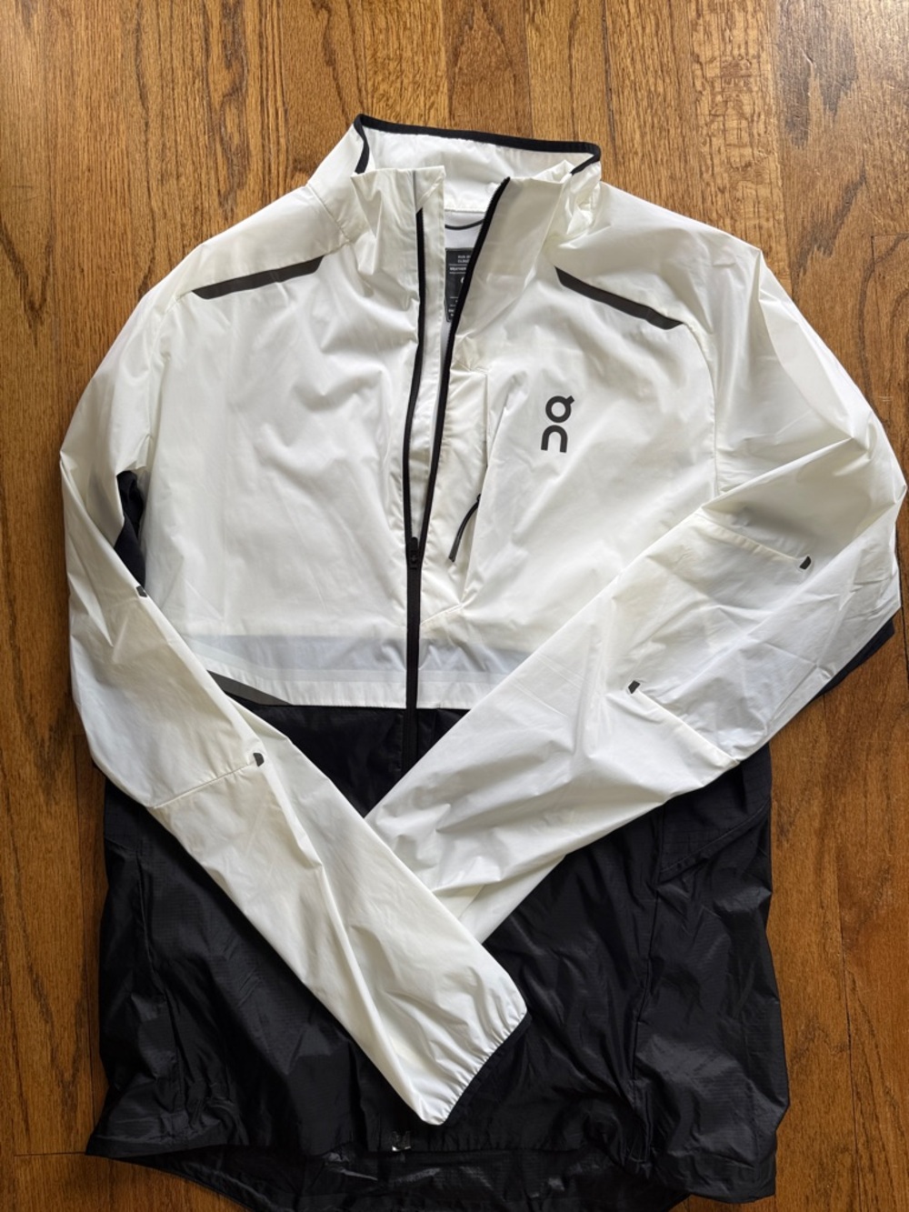 On Running White and Black Lightweight Windbreaker Jacket
